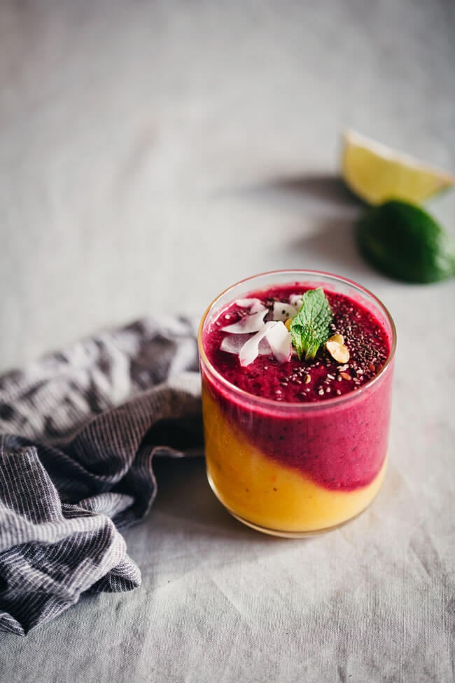 Master immunity-boosting smoothie - 2 delicious layers of nutrients, mango, persimmon, beet, berries #raw #smoothie | TheAwesomeGreen.com