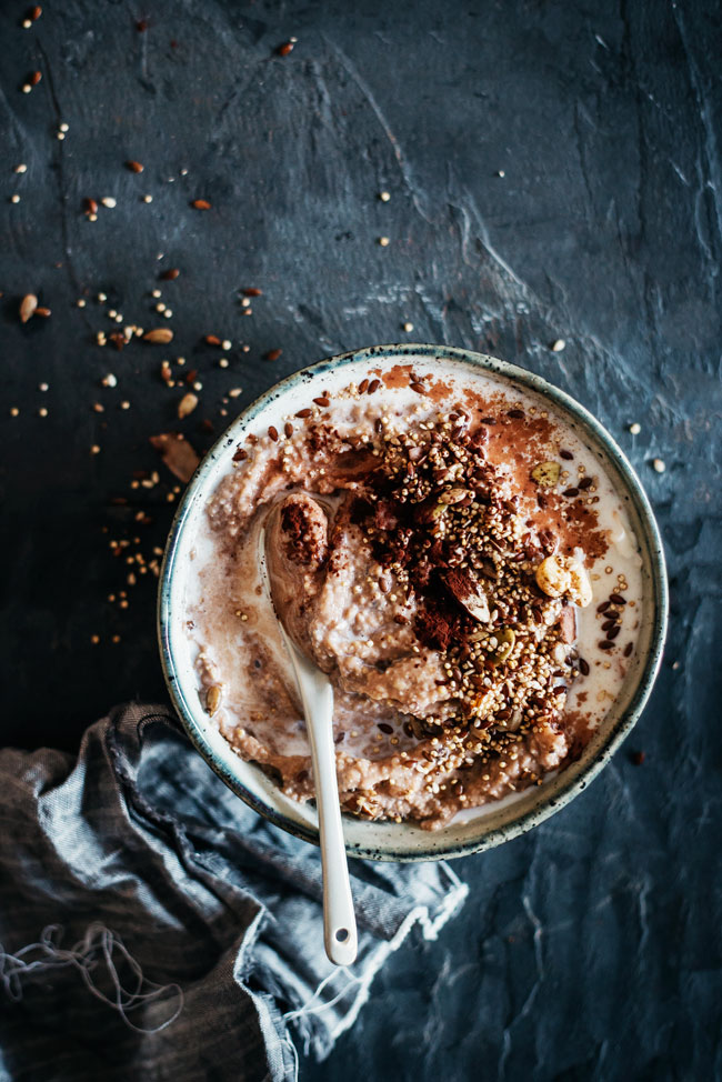 Whipped Chocolate Porridge with Quinoa, Nut and Seed Crunch #breakfast #vegan | TheAwesomeGreen.com