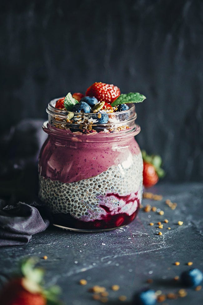 Layered Breakfast Jar with fresh strawberries, chia, acai smoothie, and bee pollen #raw | TheAwesomeGreen.com