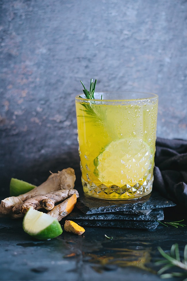 Cozy turmeric lemonade with ginger, lime and herbs #anti-inflammatory #detox | TheAwesomeGreen.com