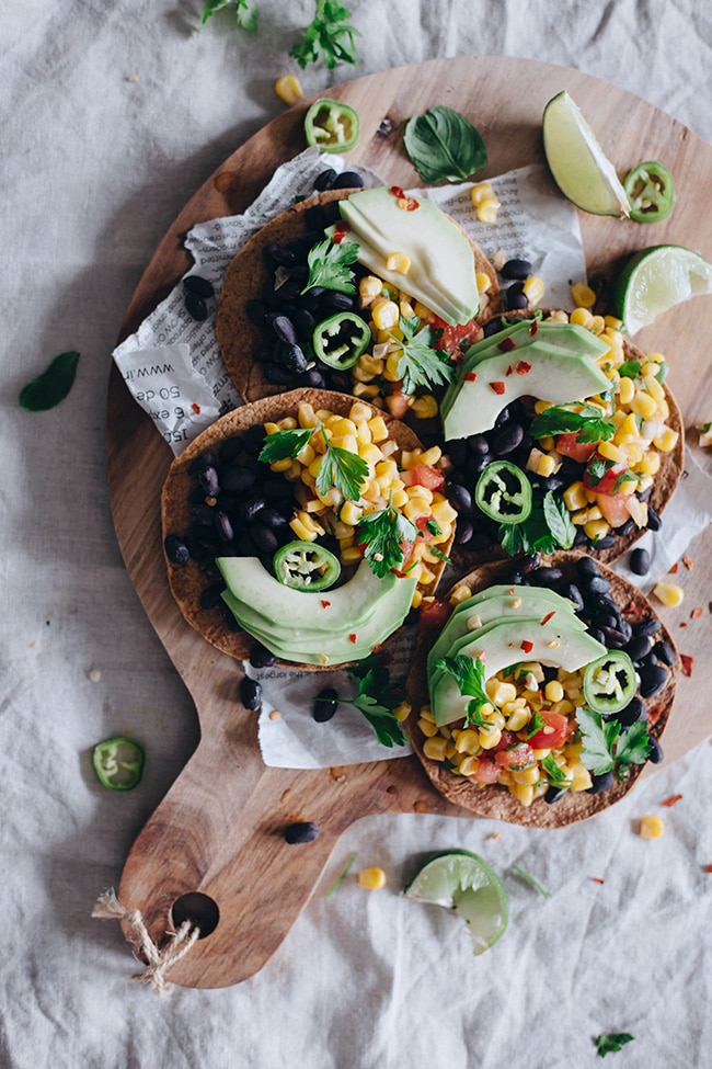 Summer tostadas with spicy black beans, avocado and corn salsa #vegan | TheAwesomeGreen.com