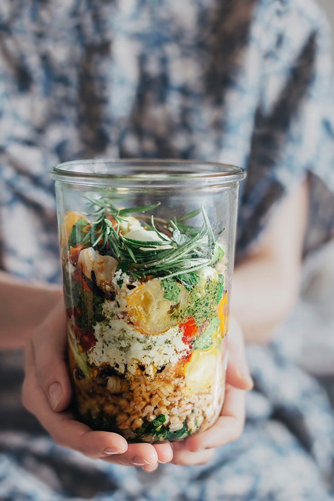 Layered summer salad with farro, grilled vegetables, feta and pesto #vegetarian | TheAwesomeGreen.com