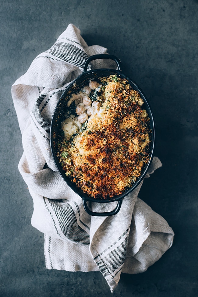 Loaded cauliflower casserole with kale and chickpeas, perfect for the Thanksgiving dinner! #vegan #healthy #thanksgiving #foodstyling #foodphotography | TheAwesomeGreen.com