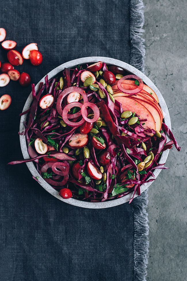 Sauerkraut salad with cranberries, beet and seeds for immune support and healthy gut #immunesupport #healthygut#raw #salad #sauerkraut #christmas #foodphotography #foodstyling | TheAwesomeGreen.com