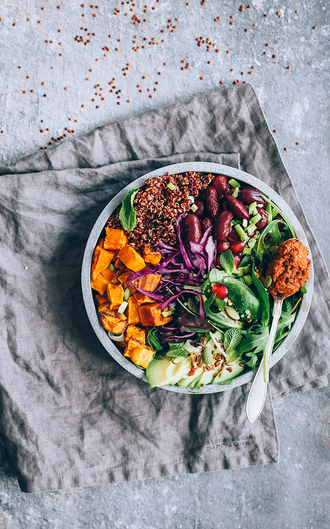 Hearty Buddha bowl recipe, with red quinoa, sauerkraut and sweet potato #vegan #buddhabowl #winterbowl #salad #detox #healthy | TheAwesomeGreen.com