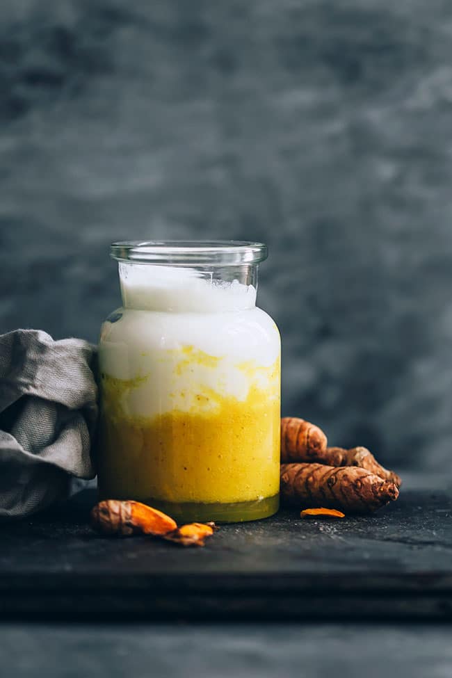 Layered digestive healing breakfast smoothie with turmeric and pumpkin #smoothie #breakfast #ayurveda #turmeric #cleanse | TheAwesomeGreen.com