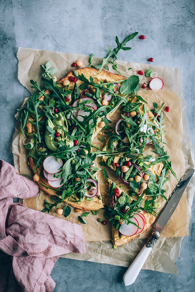 Chickpea pizza crust with spring greens and asparagus, vegan and gluten-free #glutenfree #pizza #asparagus #spring #vegan | TheAwesomeGreen.com