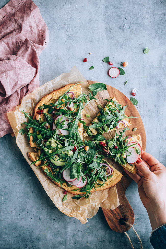 Chickpea pizza crust with asapragus and greens #glutenfree #pizza #asparagus #spring #vegan | TheAwesomeGreen.com