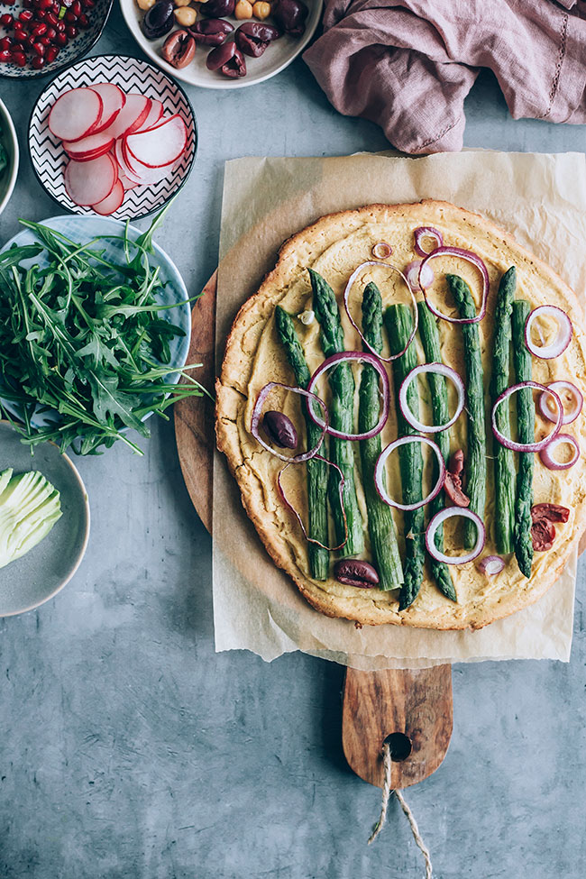 Gluten-free pizza crust with spring greens and asparagus #glutenfree #pizza #asparagus #spring #vegan | TheAwesomeGreen.com