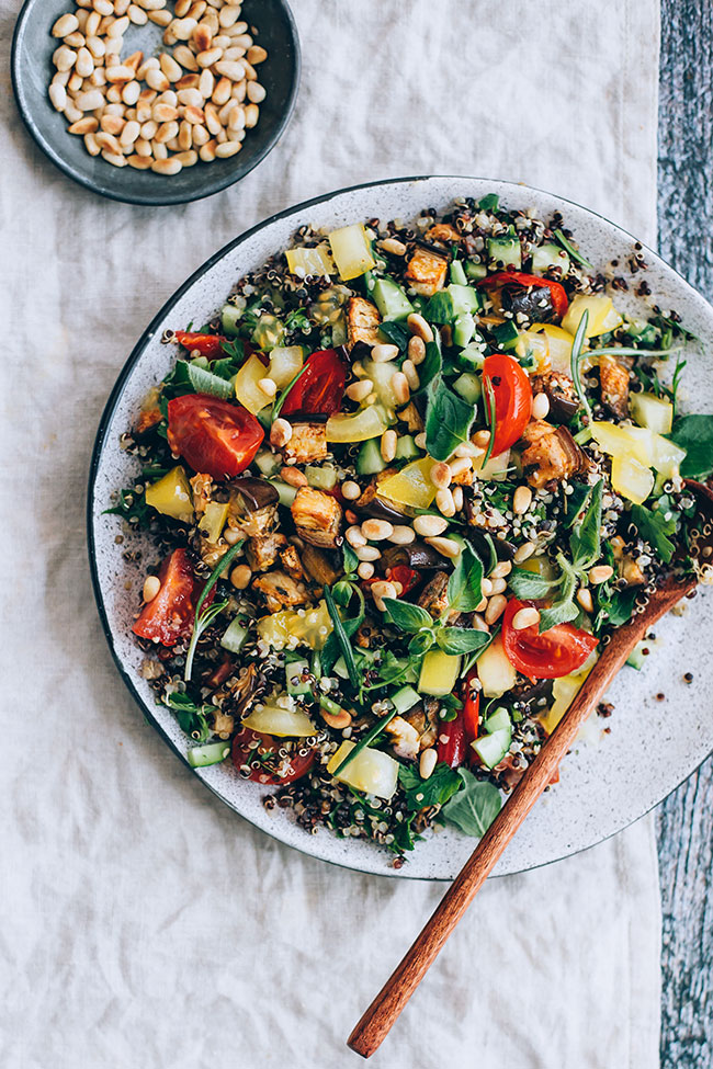 Mediterranean quinoa salad with fresh and roasted vegetables, toasted pine nuts and aromatic herbs #vegan #summer #salad #mediterranean | TheAwesomeGreen.com