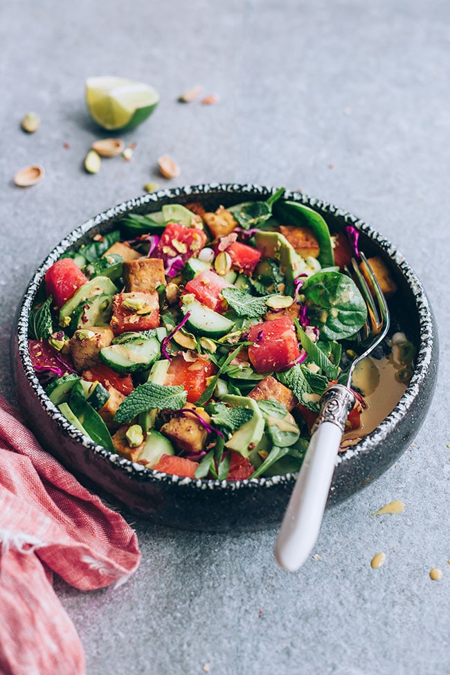 Watermelon salad with avocado, fried tofu and Asian dressing #watermelon #salad #summersalad #vegan | TheAwesomeGreen.com