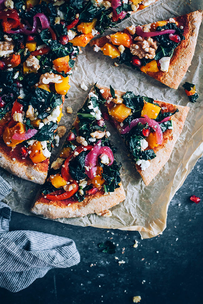 Loaded autumn pizza with kale, pumpkin and goat cheese #pizza #vegetarian #kale #pumpkin | TheAwesomeGreen.com