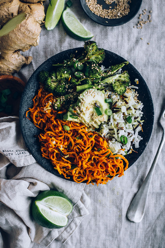 Sweet potato noodles bowl with broccoli, avocado and wild rice, plus ginger tamari dressing #vegan #spiralizer #spiralled #broccoli #sweetpotato #healthyrecipe #foodphotography #foodstyling | TheAwesomeGreen.com