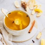 Intermittent fasting tea cup with ginger, lemon and spices