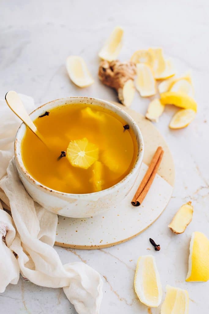 Intermittent fasting tea cup with ginger, lemon and spices